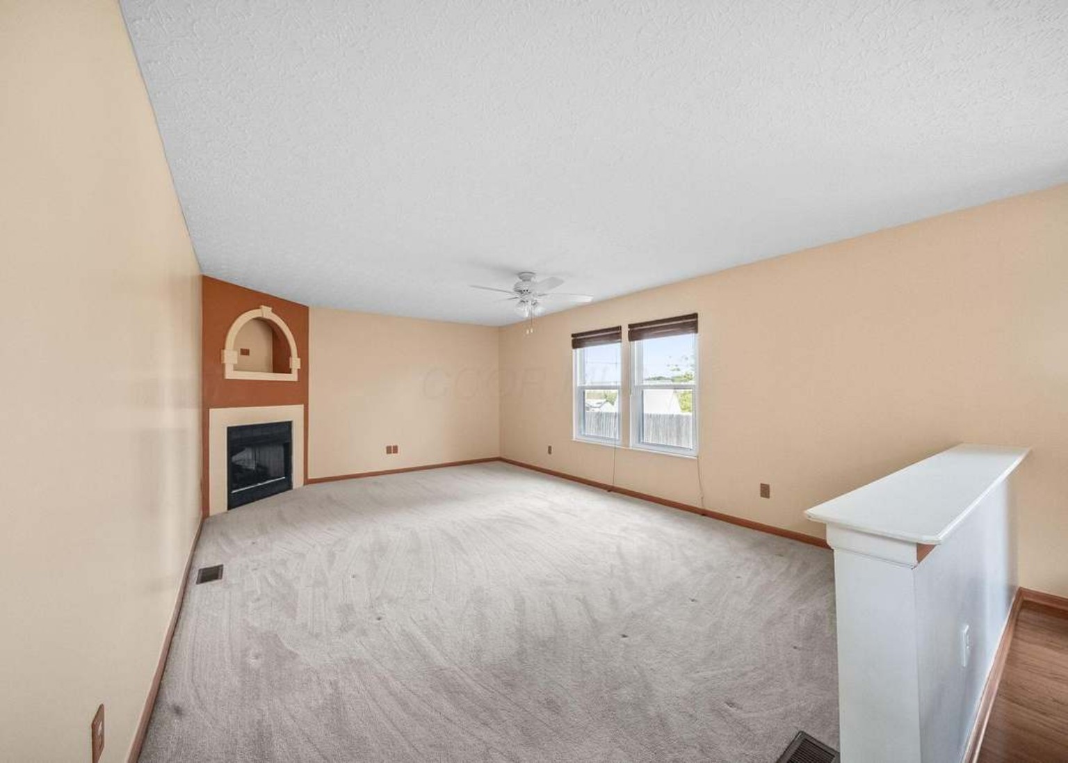 Spacious living room with fireplace